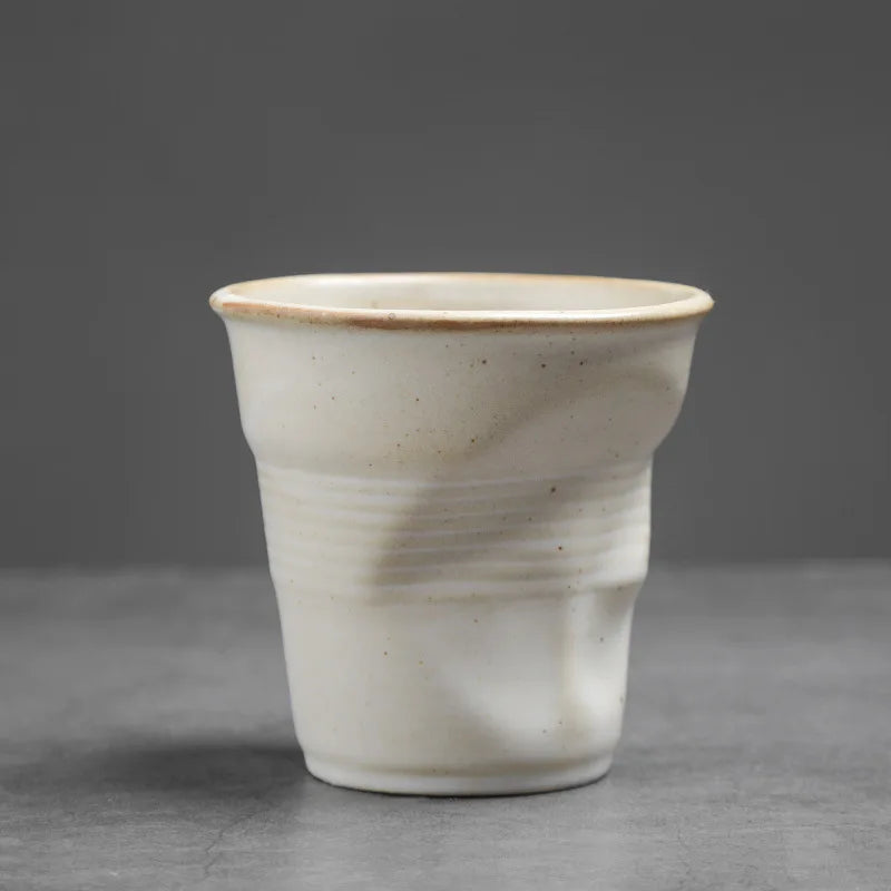 “Hand-Molded Ceramic Coffee Cup”
